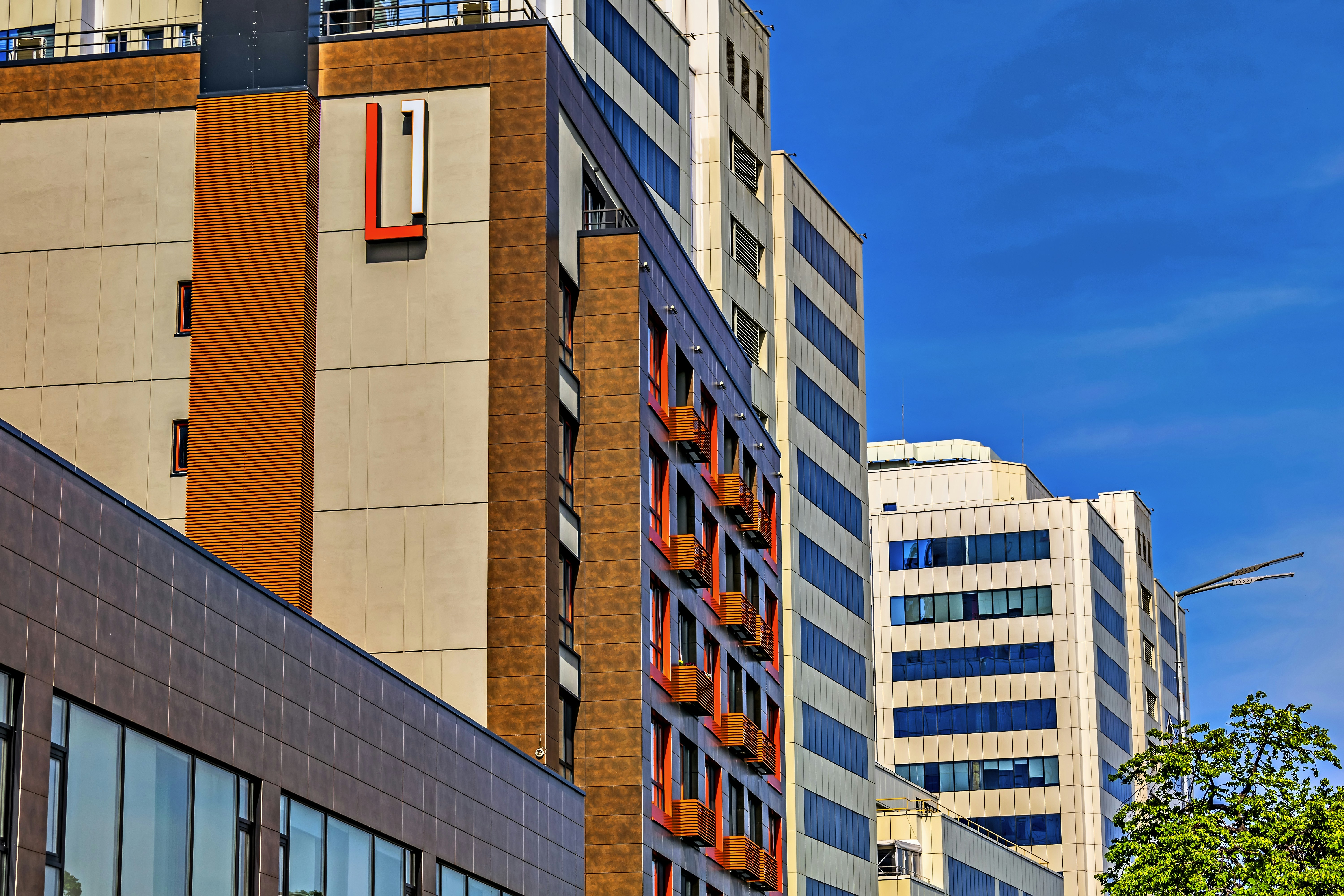 a group of tall buildings next to each other