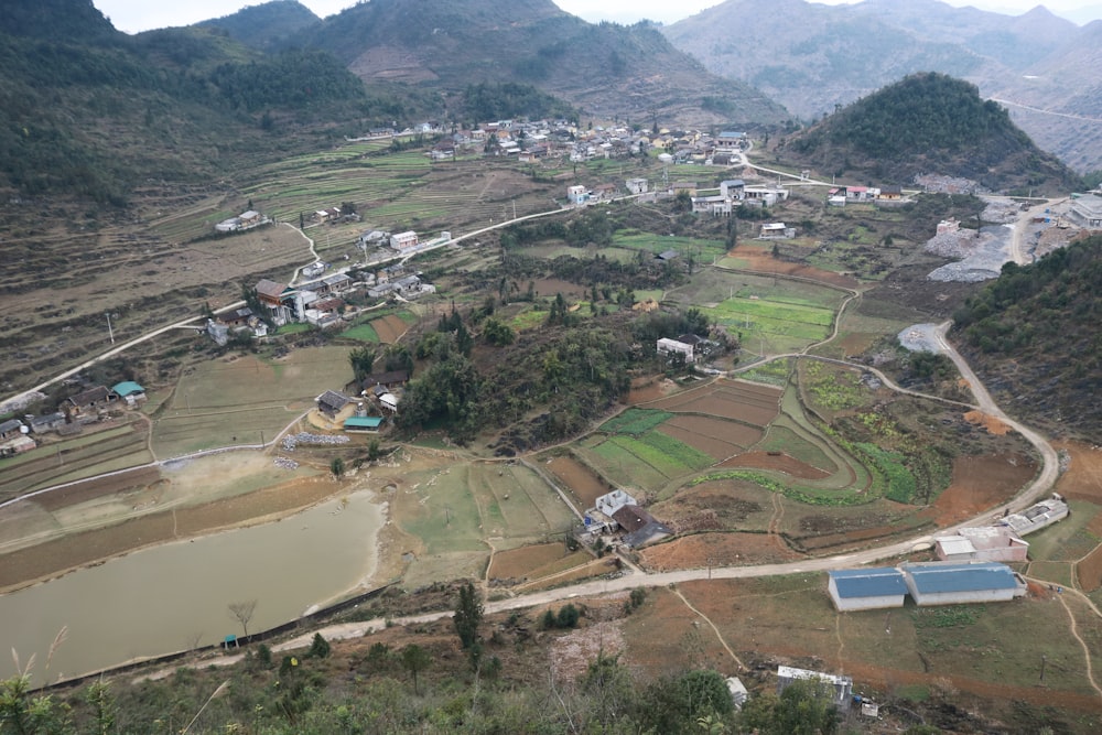 an aerial view of a small village in the mountains