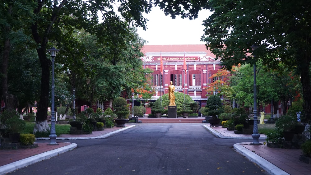 a large building with a statue in the middle of it