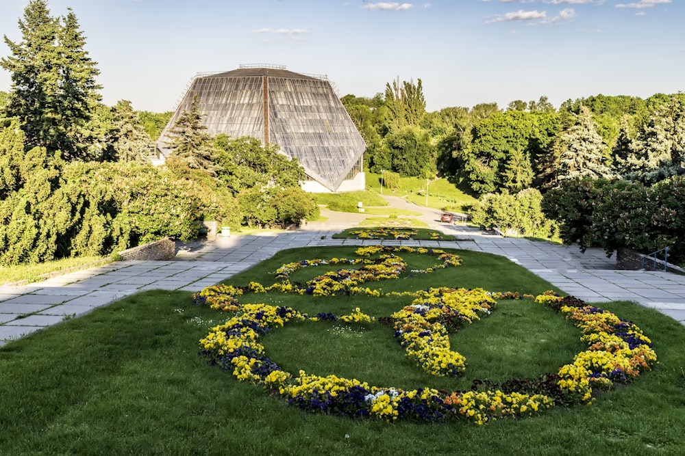 a circular garden in the middle of a grassy area