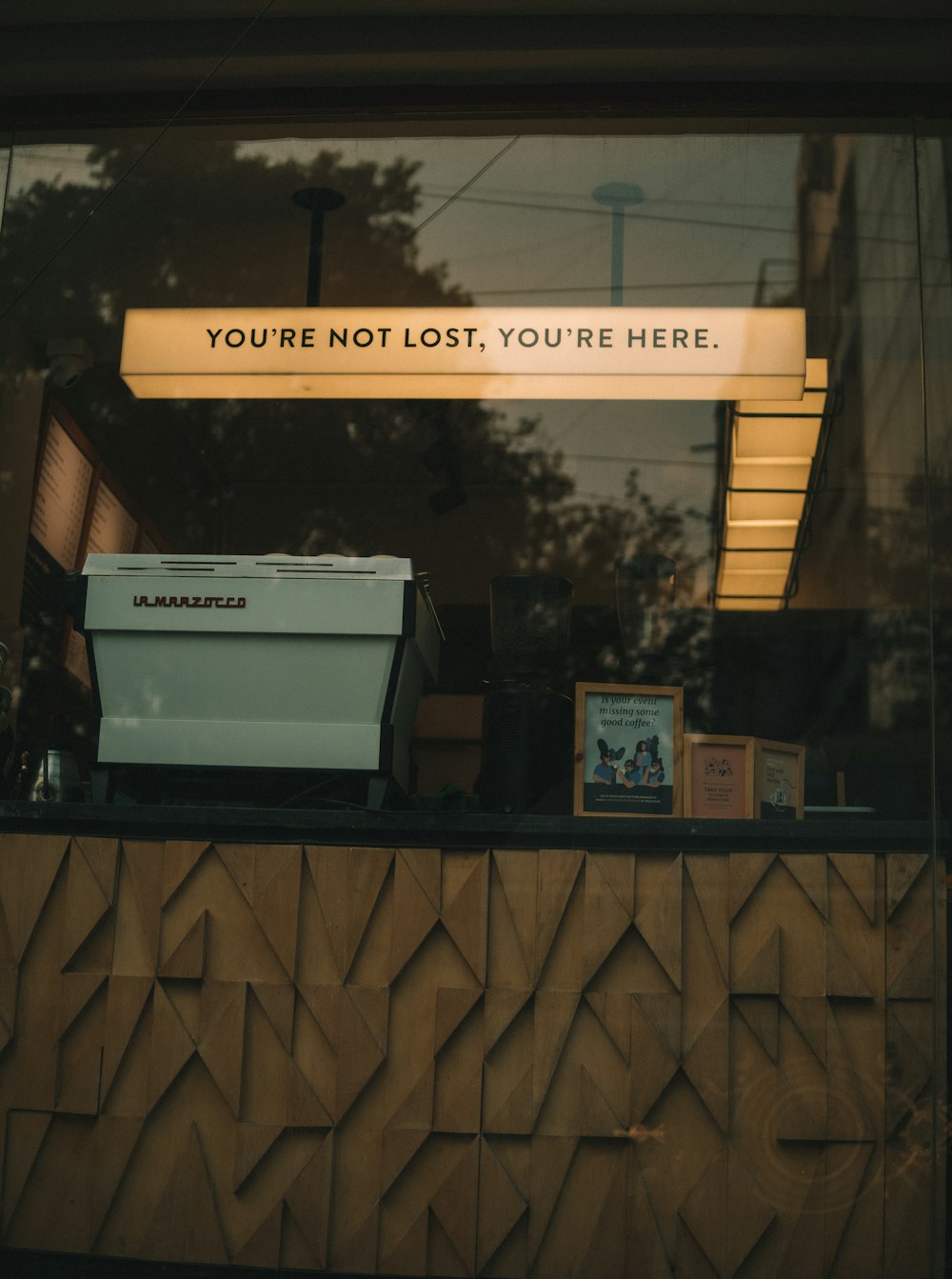 there is a sign that says you're not lost, you're here