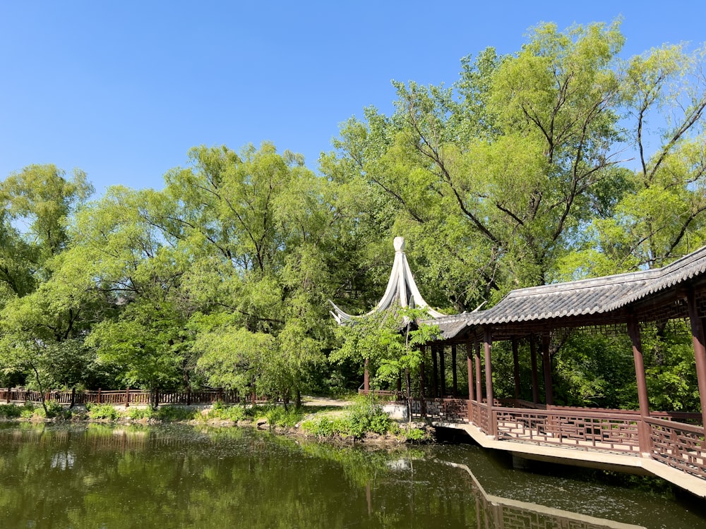 a gazebo sitting next to a body of water