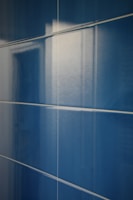 Shiny bathroom tiles reflecting light after deep cleaning