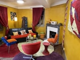 Lively family room decorated with vibrant leather accents.