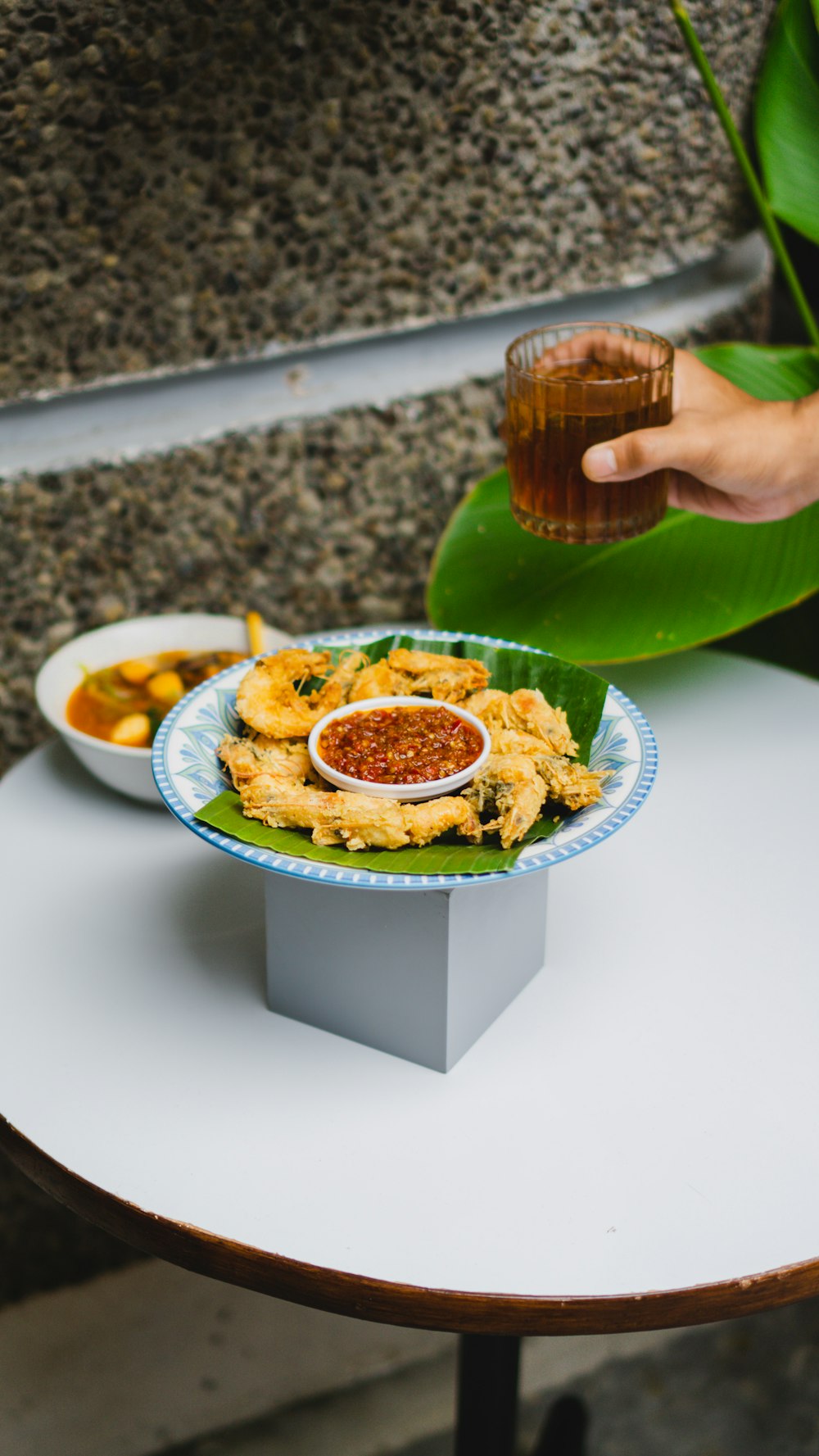 a plate of food sitting on top of a table