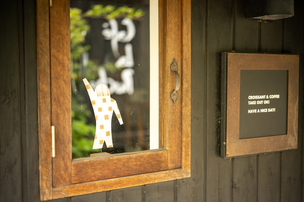 a picture of a sign in a window