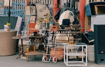 a pile of junk sitting on the side of a road