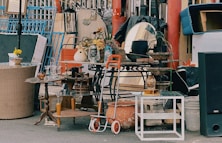 a pile of junk sitting on the side of a road