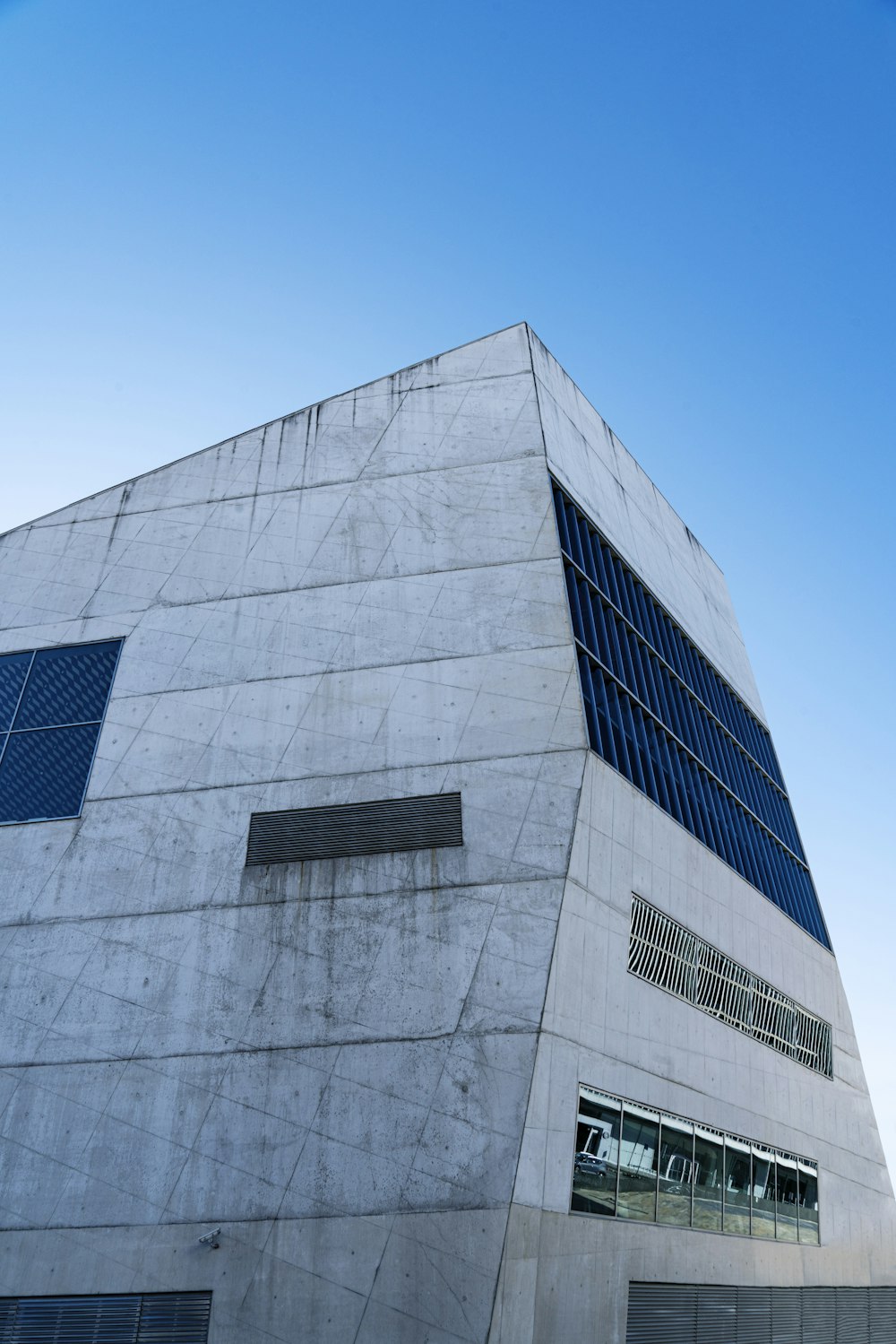 a tall building with a clock on the side of it