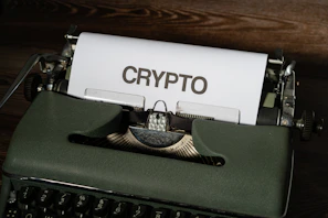 a close up of a typewriter with a paper on it
