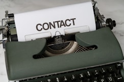 a close up of an old fashioned typewriter