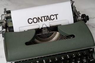 a close up of an old fashioned typewriter