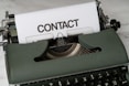 a close up of an old fashioned typewriter