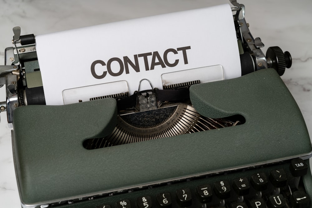 a close up of an old fashioned typewriter