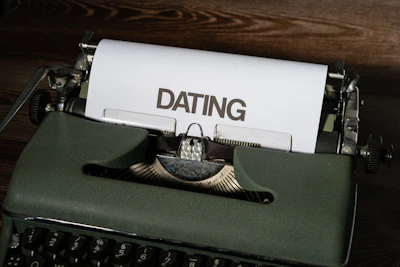 a close up of a typewriter with a paper on it