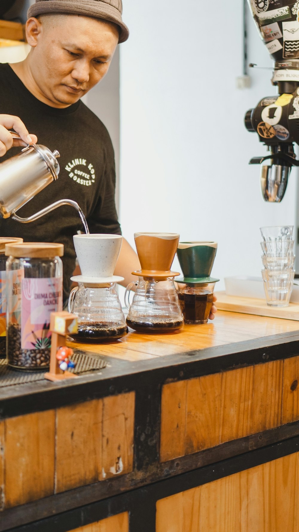 a man pours a cup of coffee