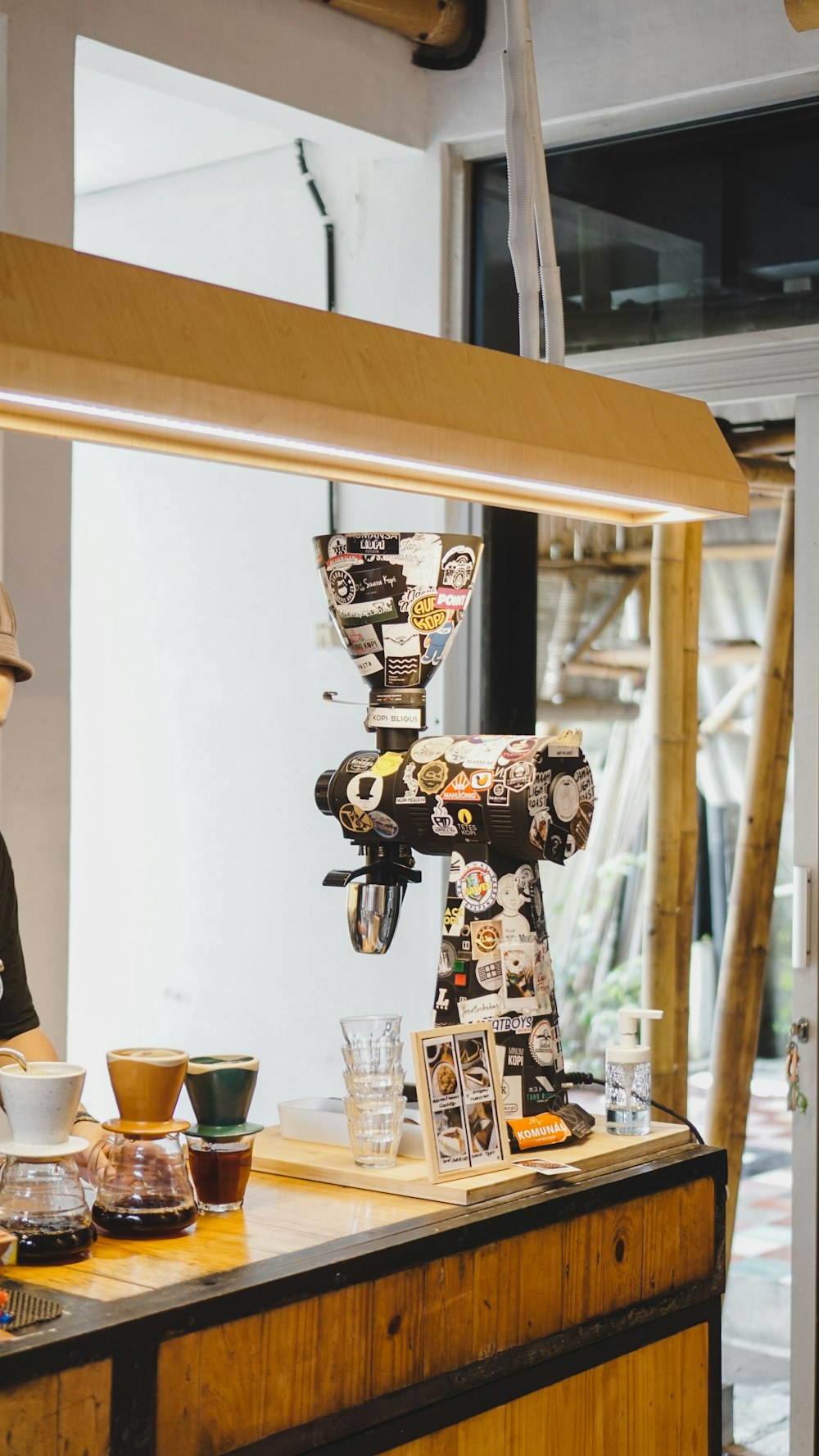 a coffee machine sitting on top of a wooden counter