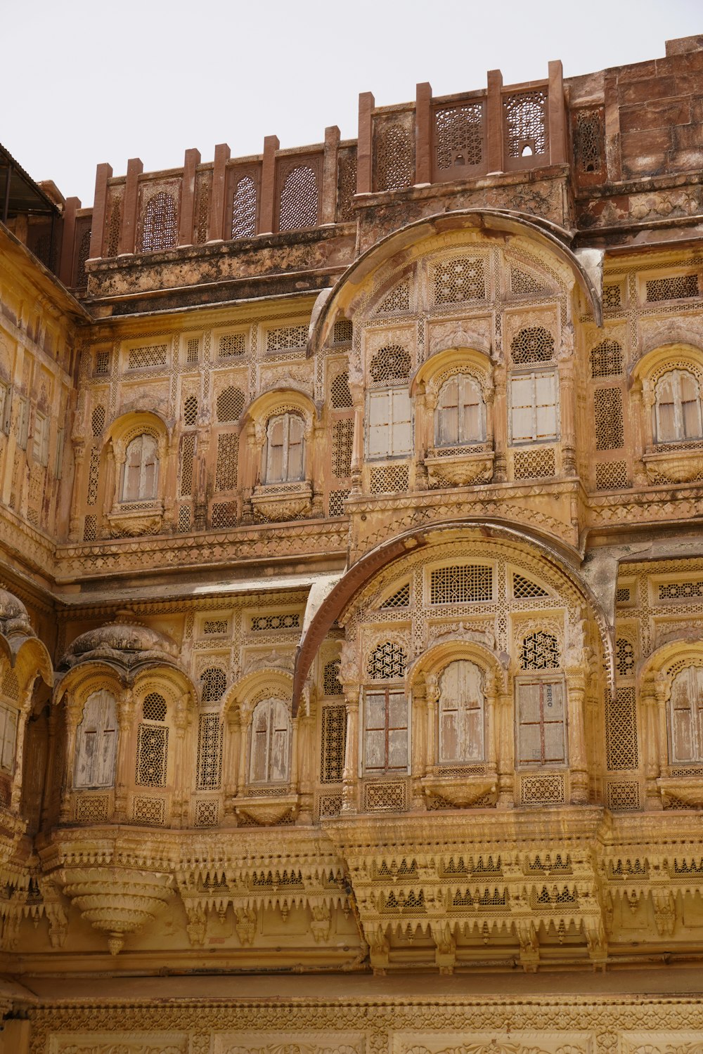 a large building with many windows and balconies