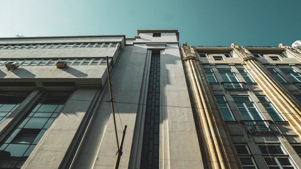 a tall building with a clock on the side of it