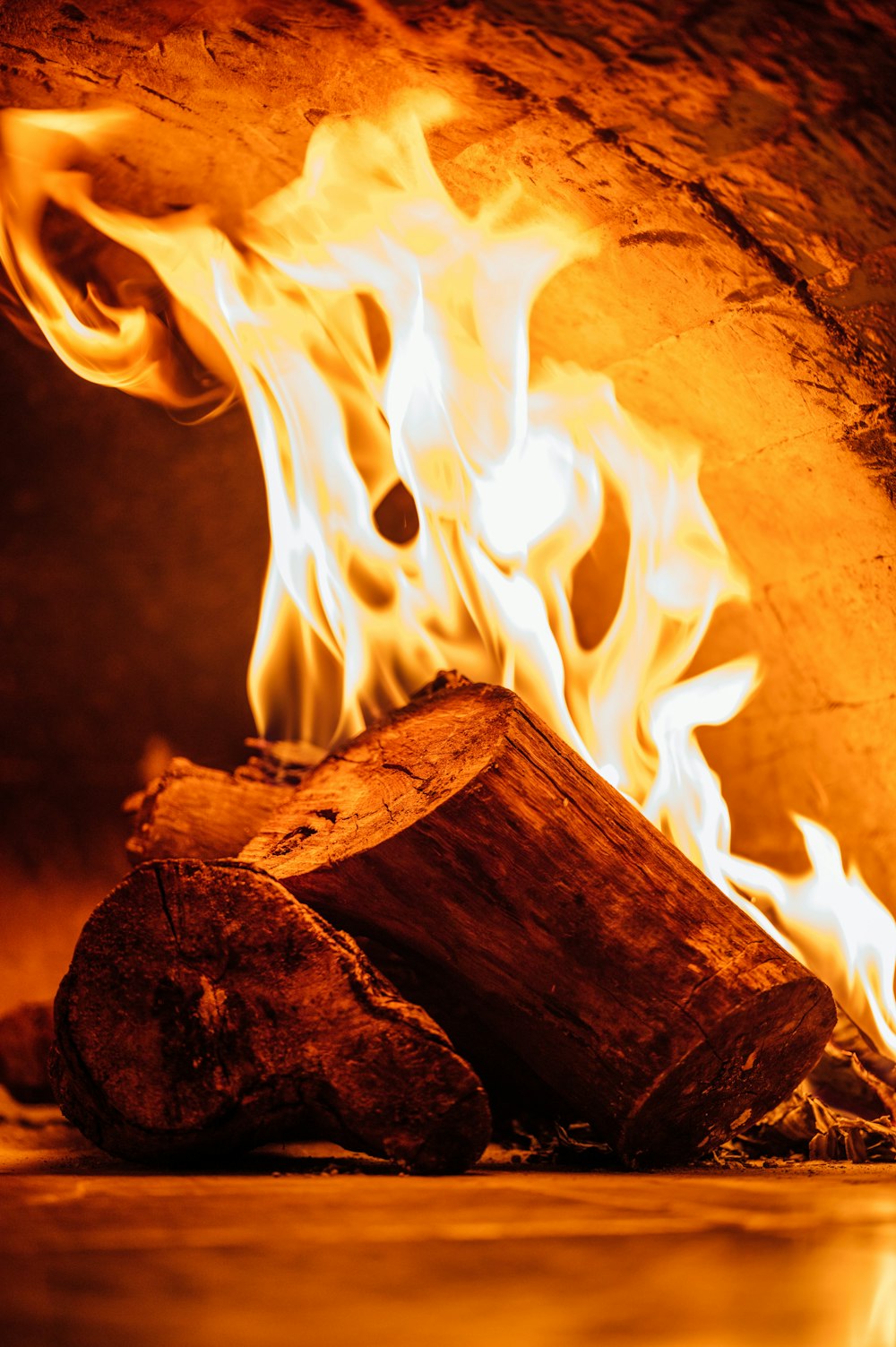 a close up of a fire burning in a fireplace