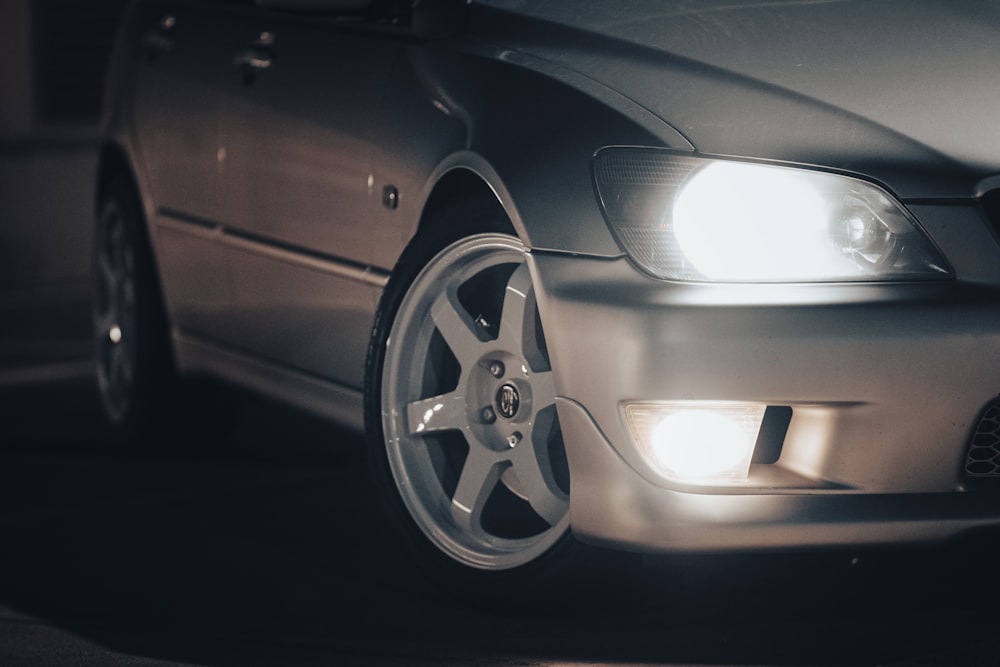 a close up of a car's front lights