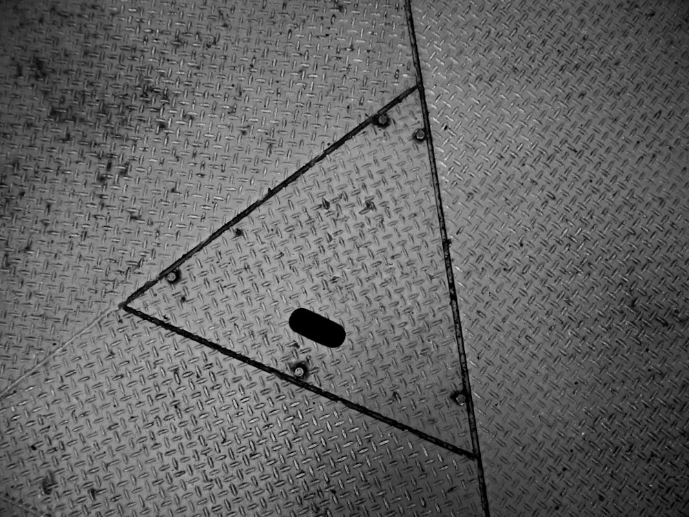 a black and white photo of a triangle