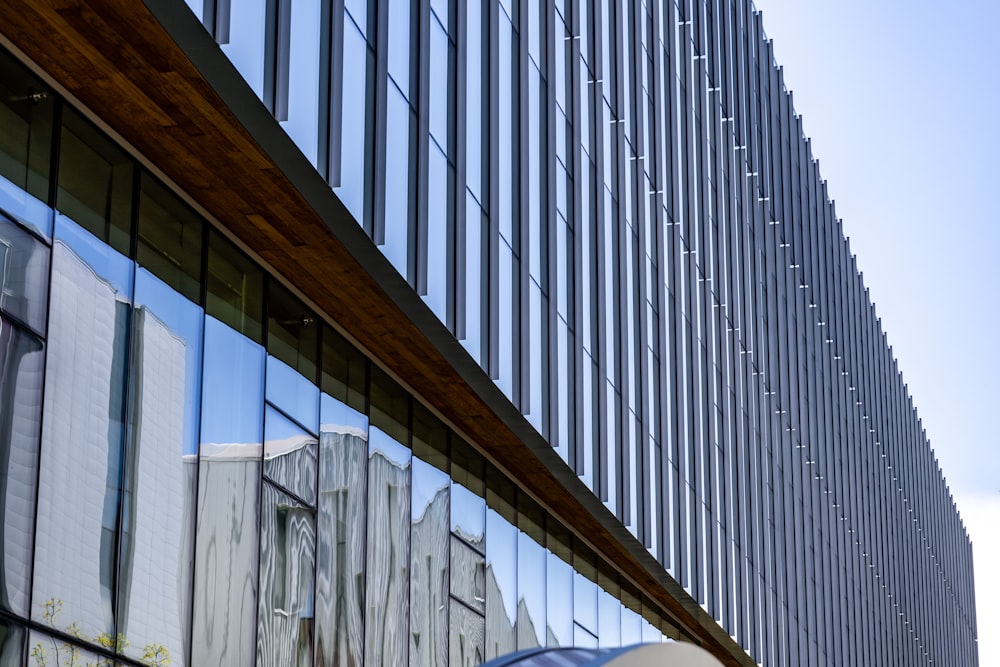 a reflection of a building in the windows of another building