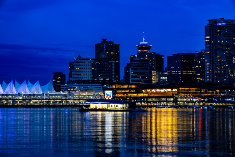 a view of a city at night from across the water