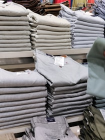 Clothes neatly organized in a community donation closet.
