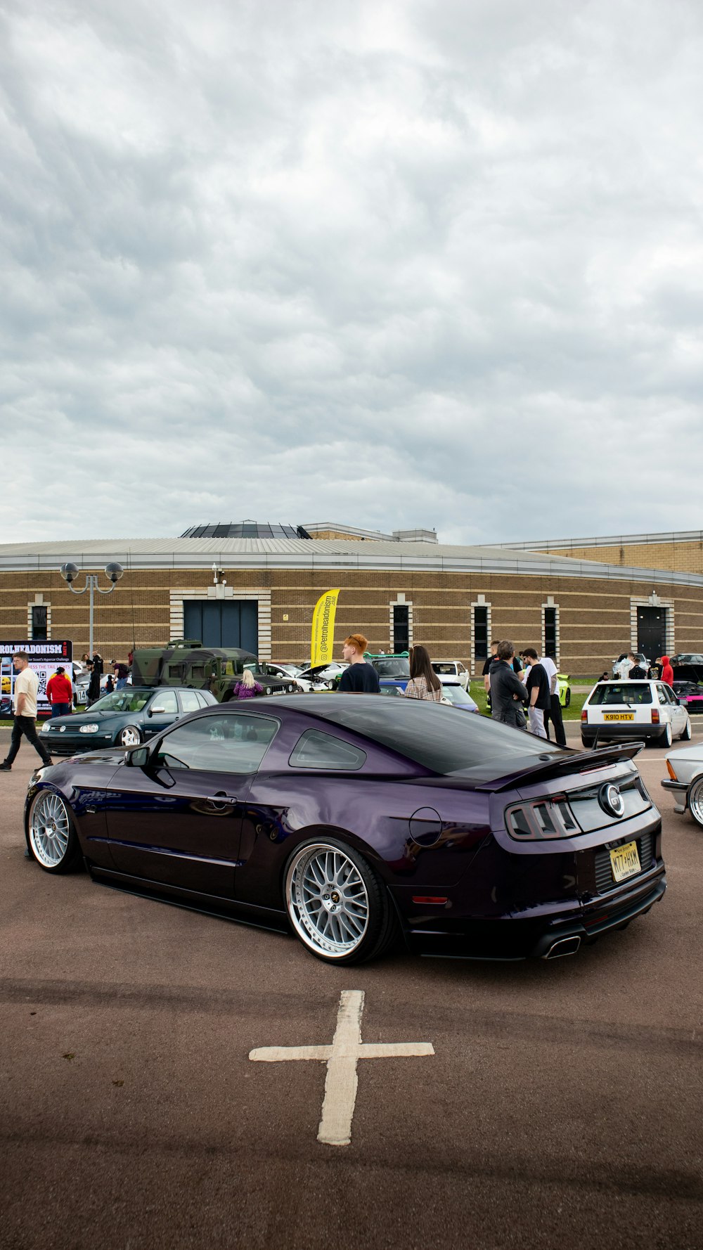 a purple car parked in a parking lot