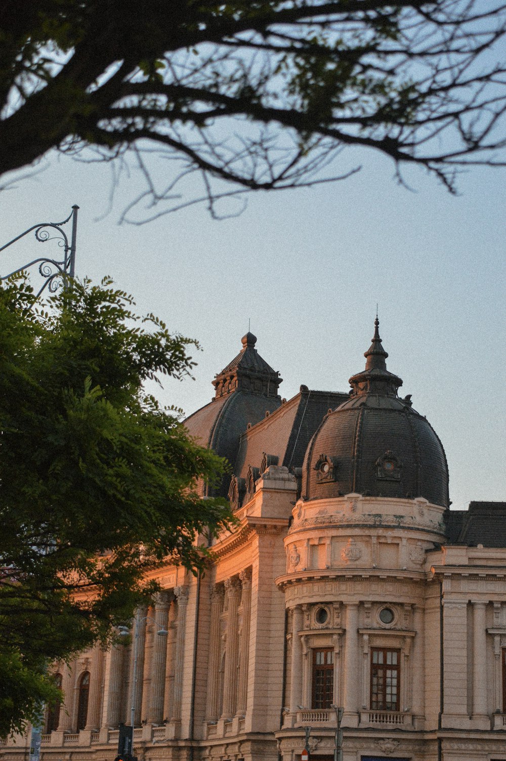 a large building with a clock on the top of it