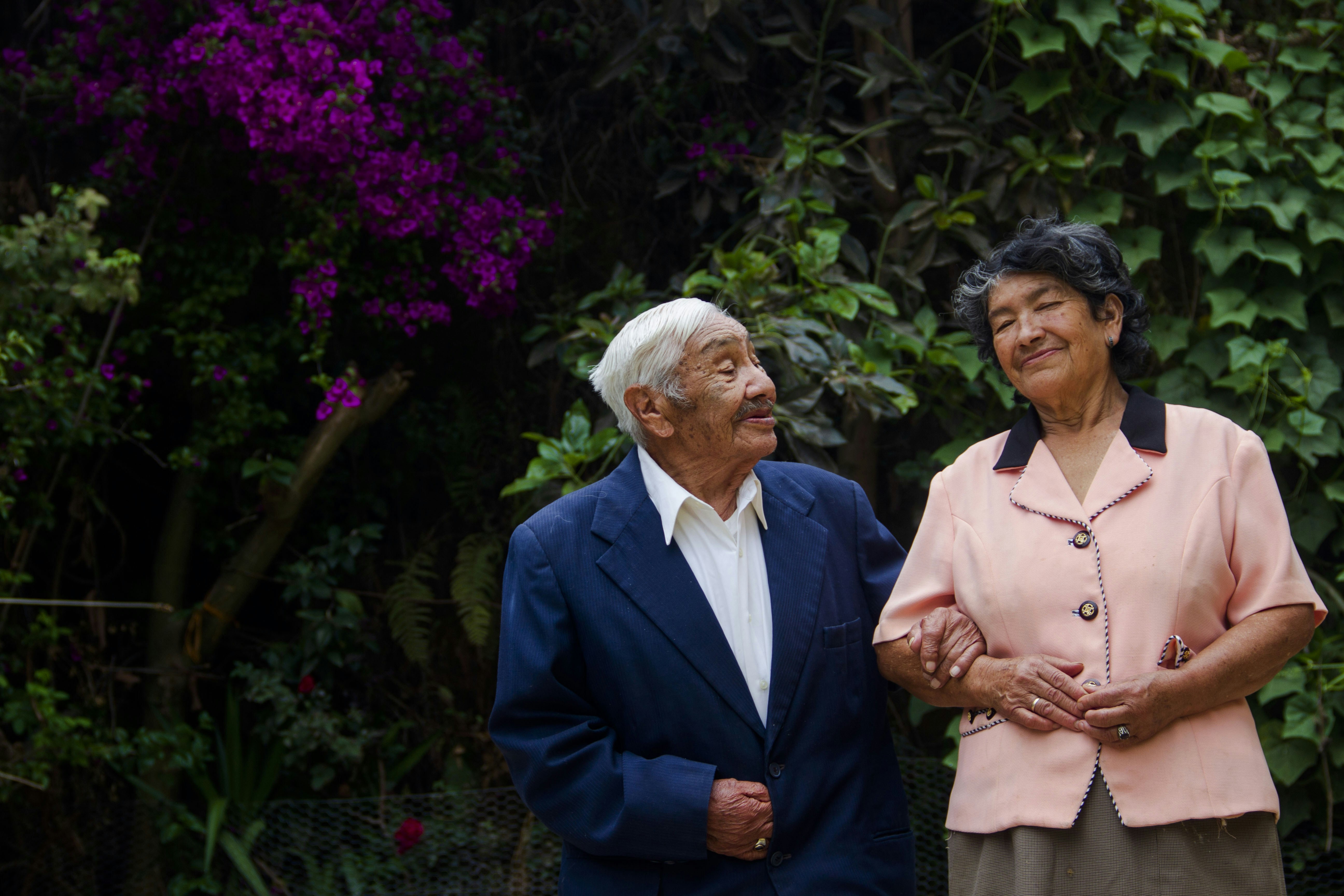 a man and a woman standing next to each other
