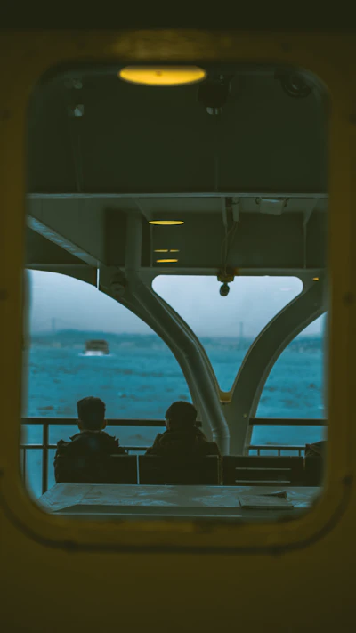Passengers on the open deck of an Istanbul ferry