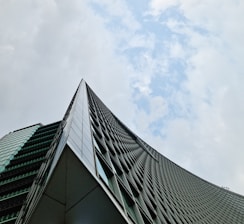 a very tall building with a sky in the background