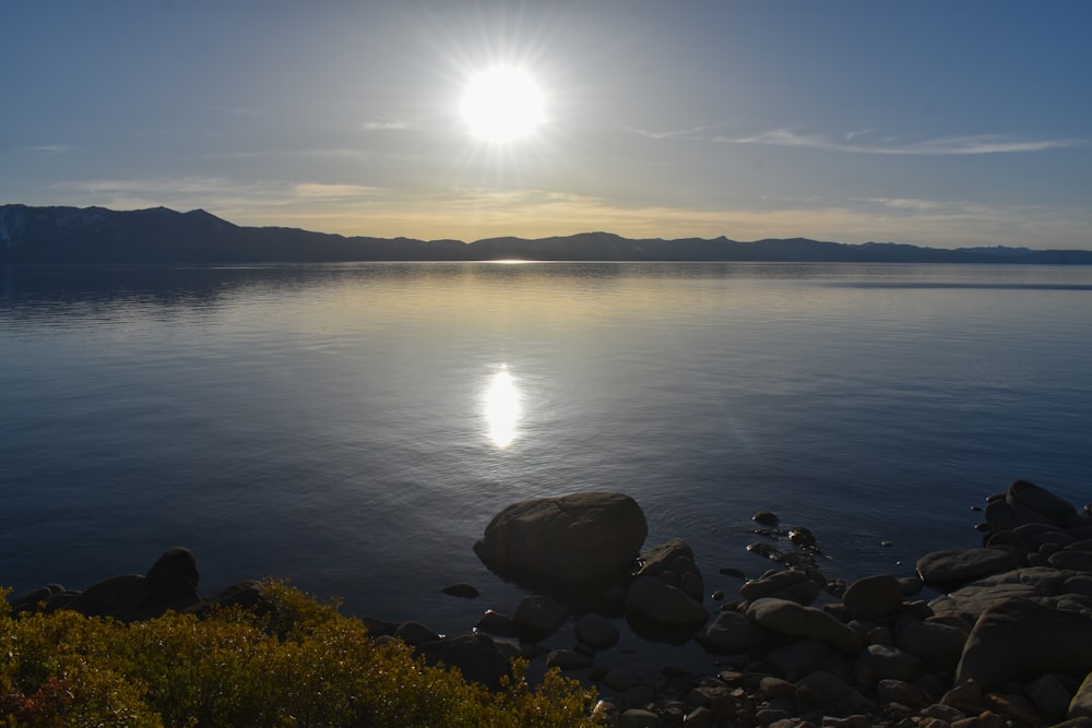 a large body of water surrounded by rocks