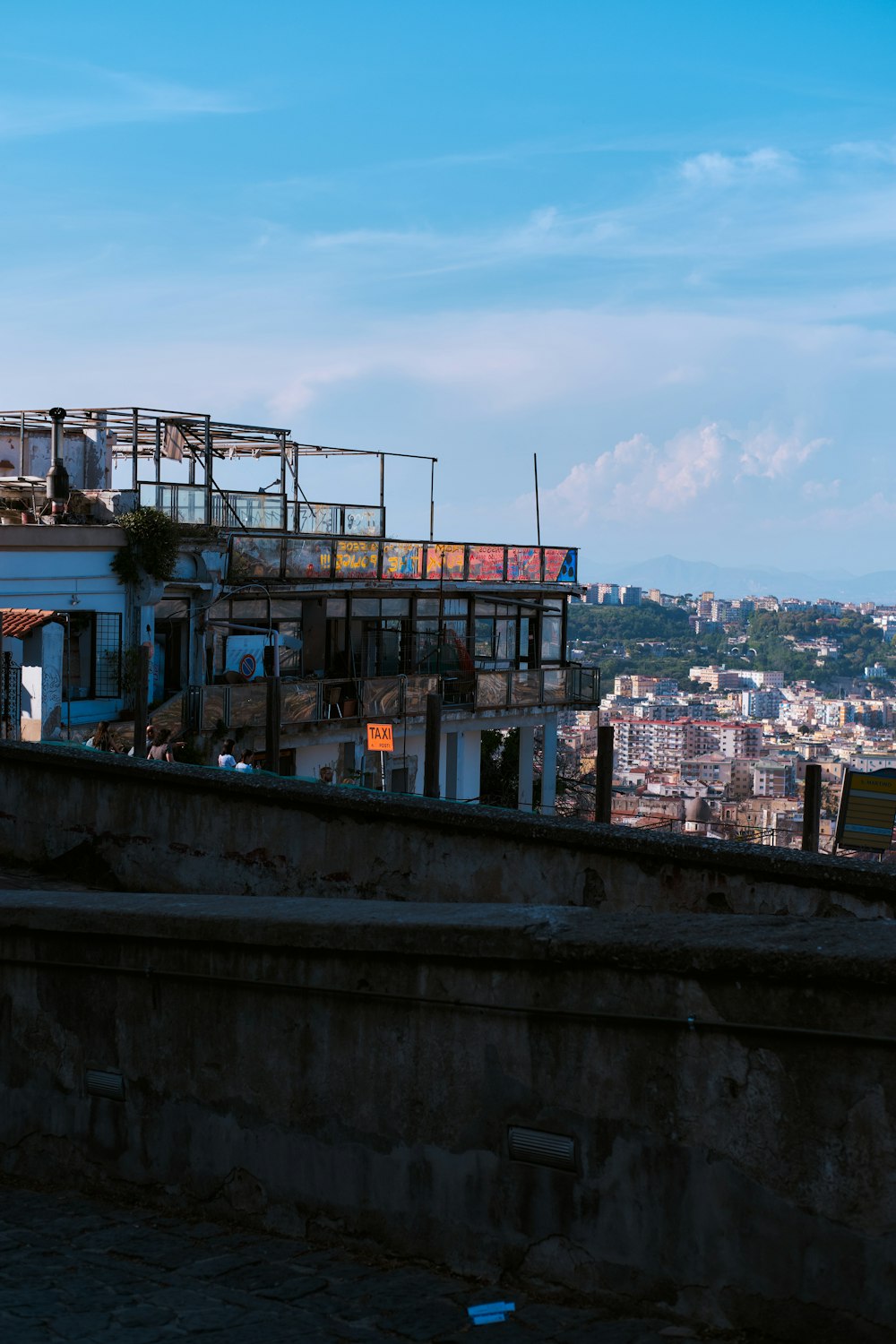 a view of a city from the top of a building