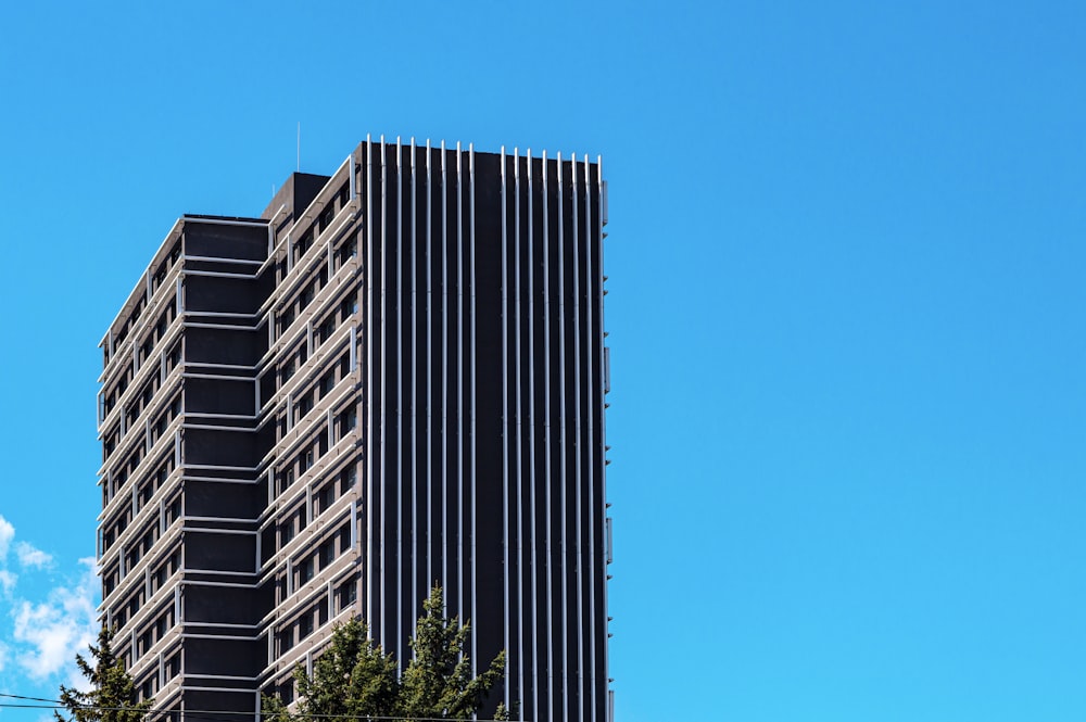 a tall building with a clock on the side of it