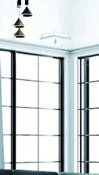 Modern home interior with windows showing sunlight and energy-efficient appliances.