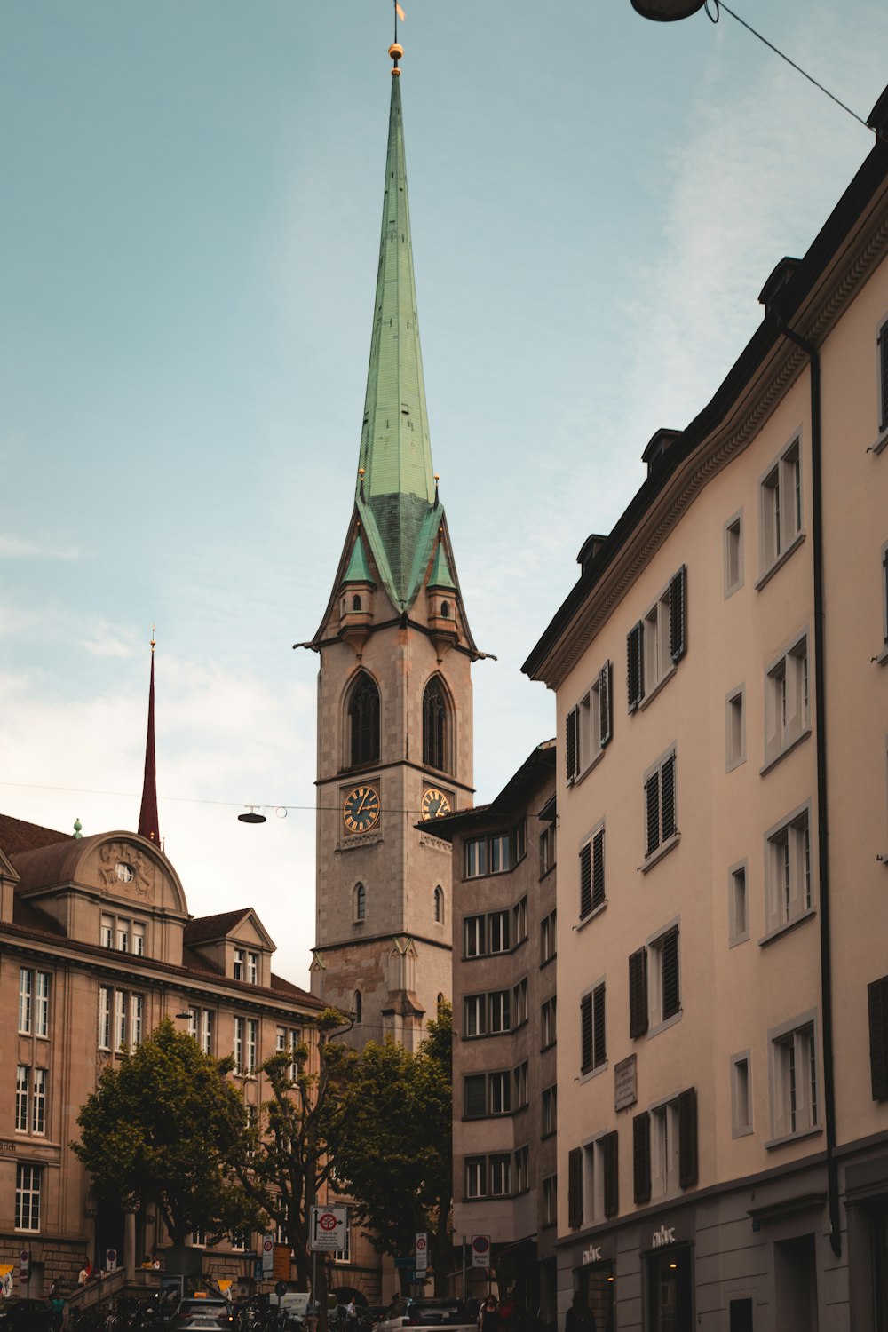 a tall clock tower towering over a city