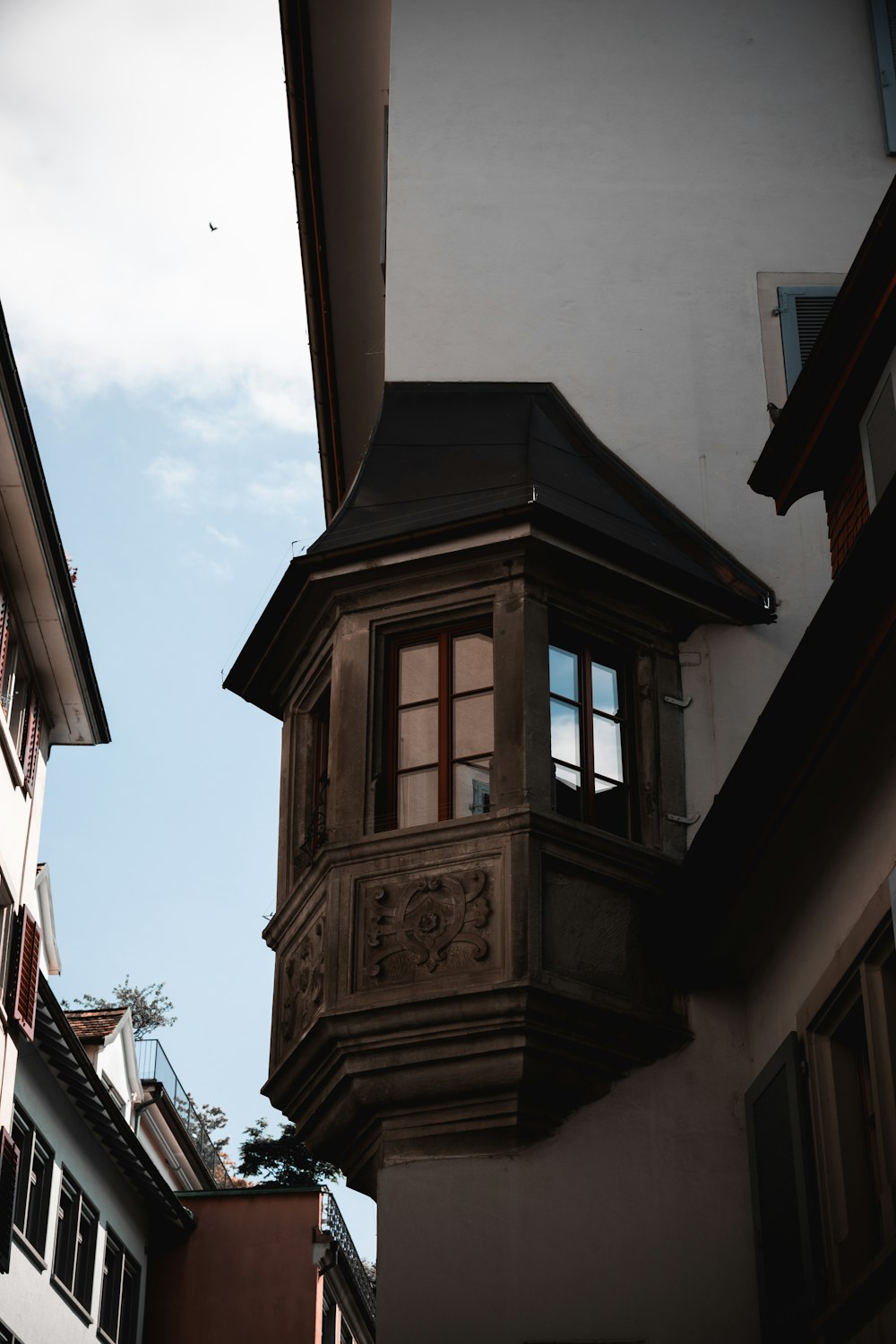 a tall building with a clock on the side of it