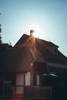 Evening light casting warm shadows on the historic timber-framed houses of Rohan.