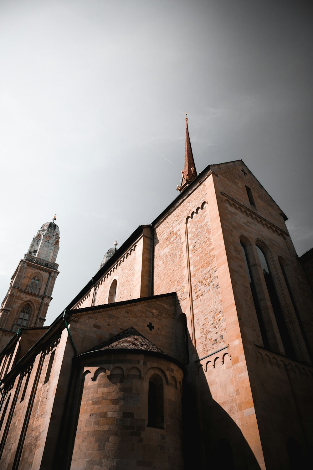 a tall brick building with a steeple on top