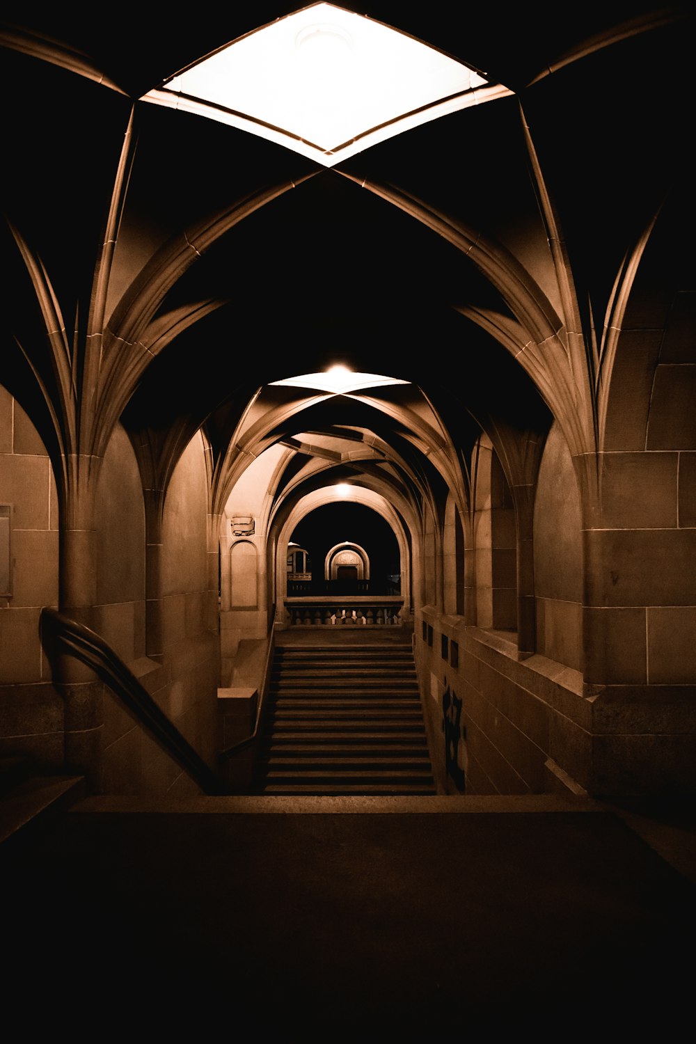 a very long hallway with a bunch of stairs