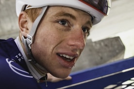 a close up of a person wearing a helmet