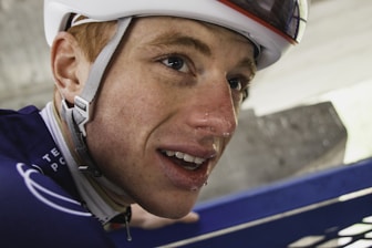 a close up of a person wearing a helmet
