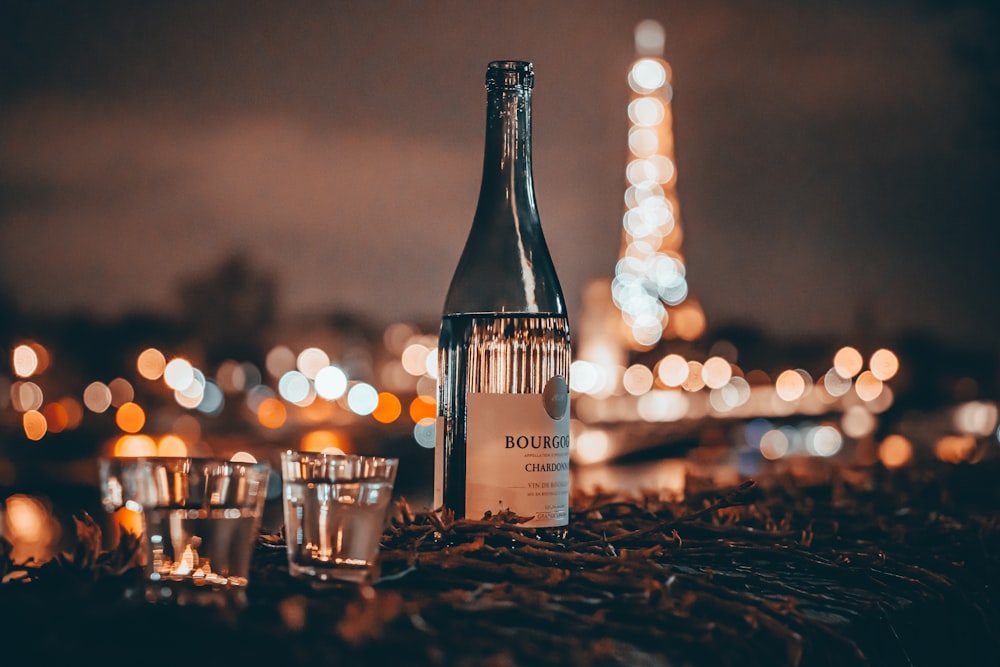 a bottle of wine sitting on top of a table