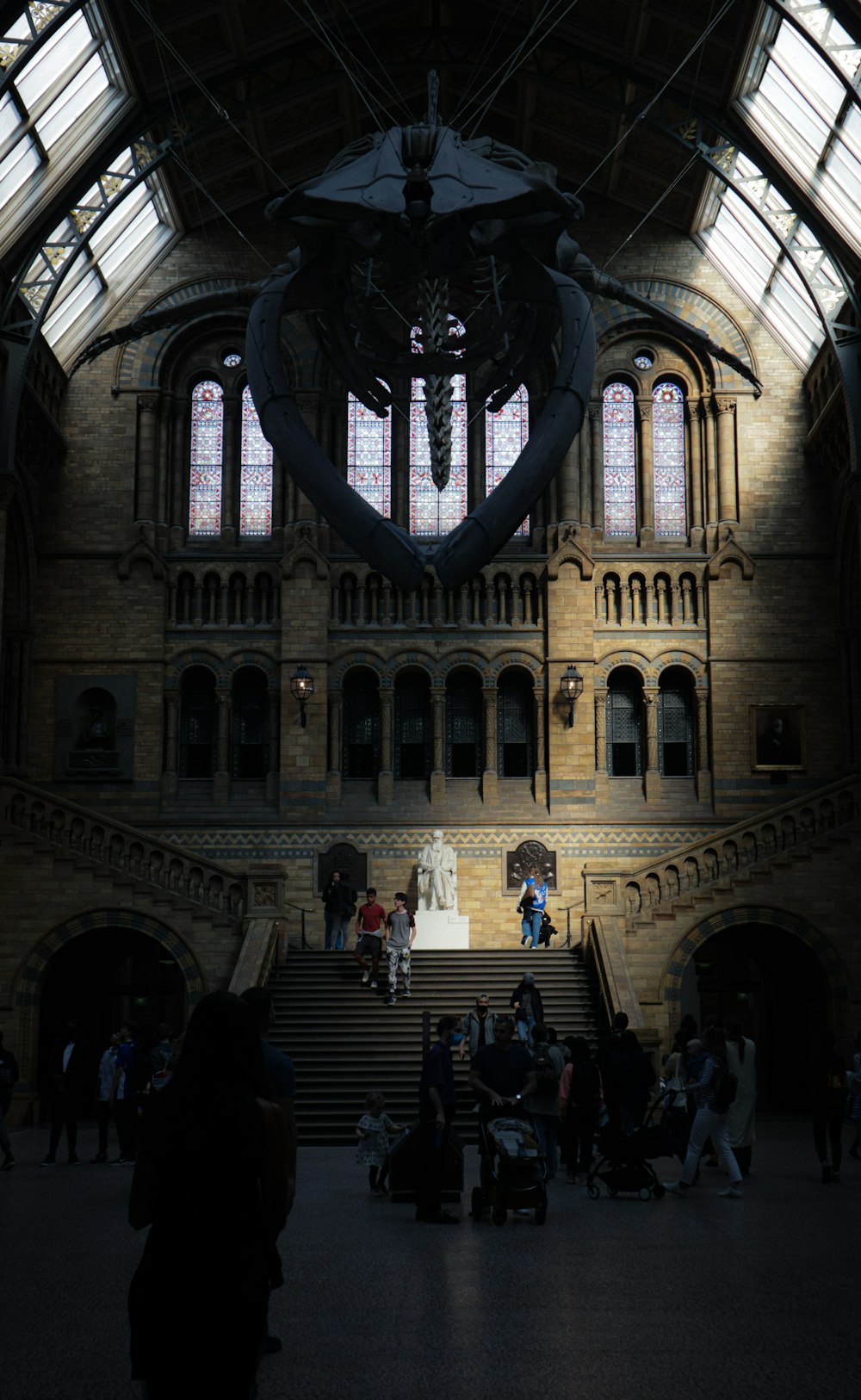 a large building with many people inside of it