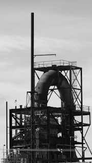 a black and white photo of a large pipe