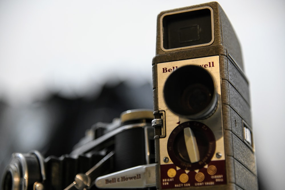 a close up of an old fashioned camera