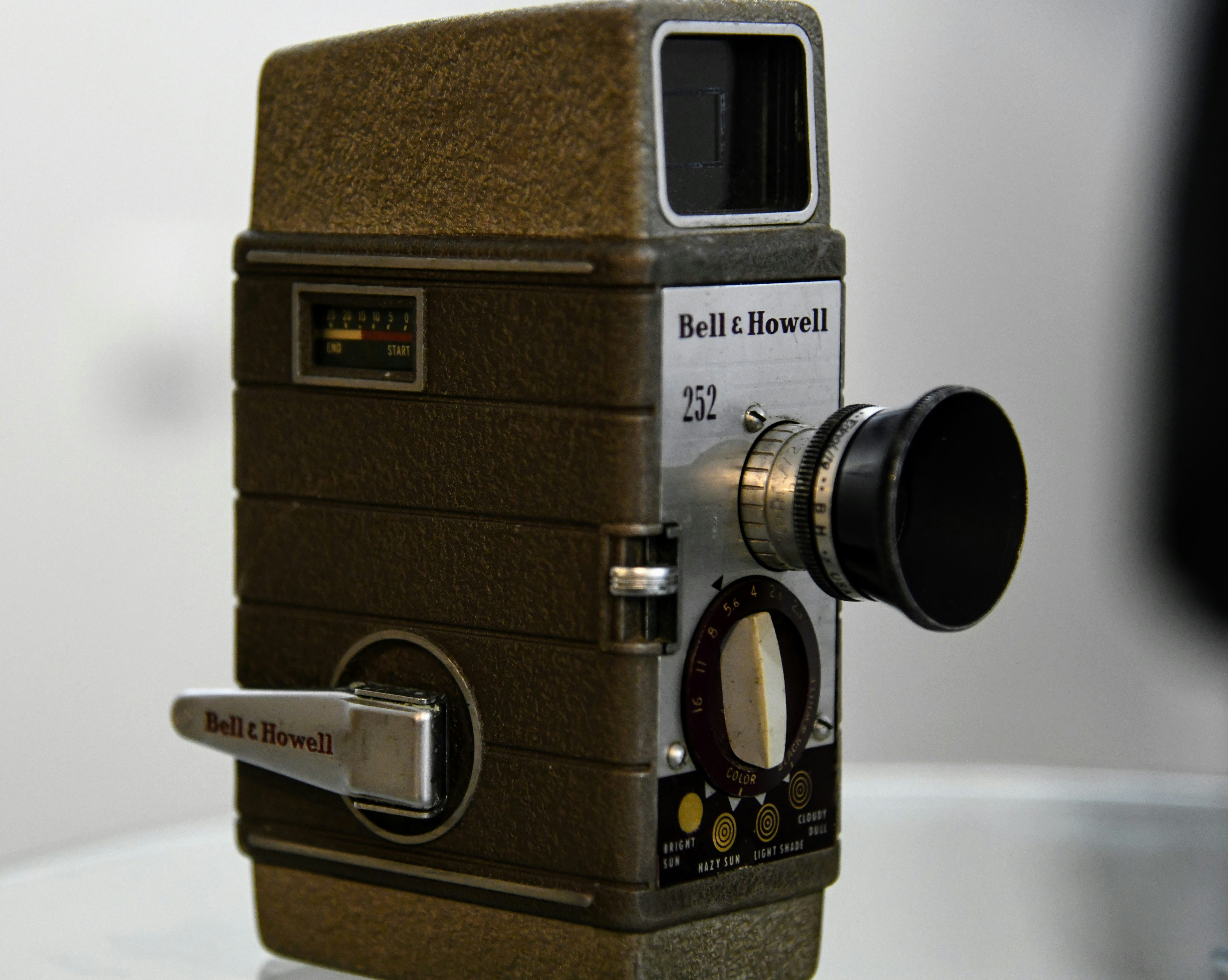 an old camera sitting on top of a table